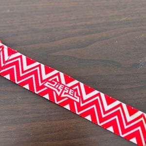 Diesel luggage strap - had some rustic wear on metal buckle looks great travel